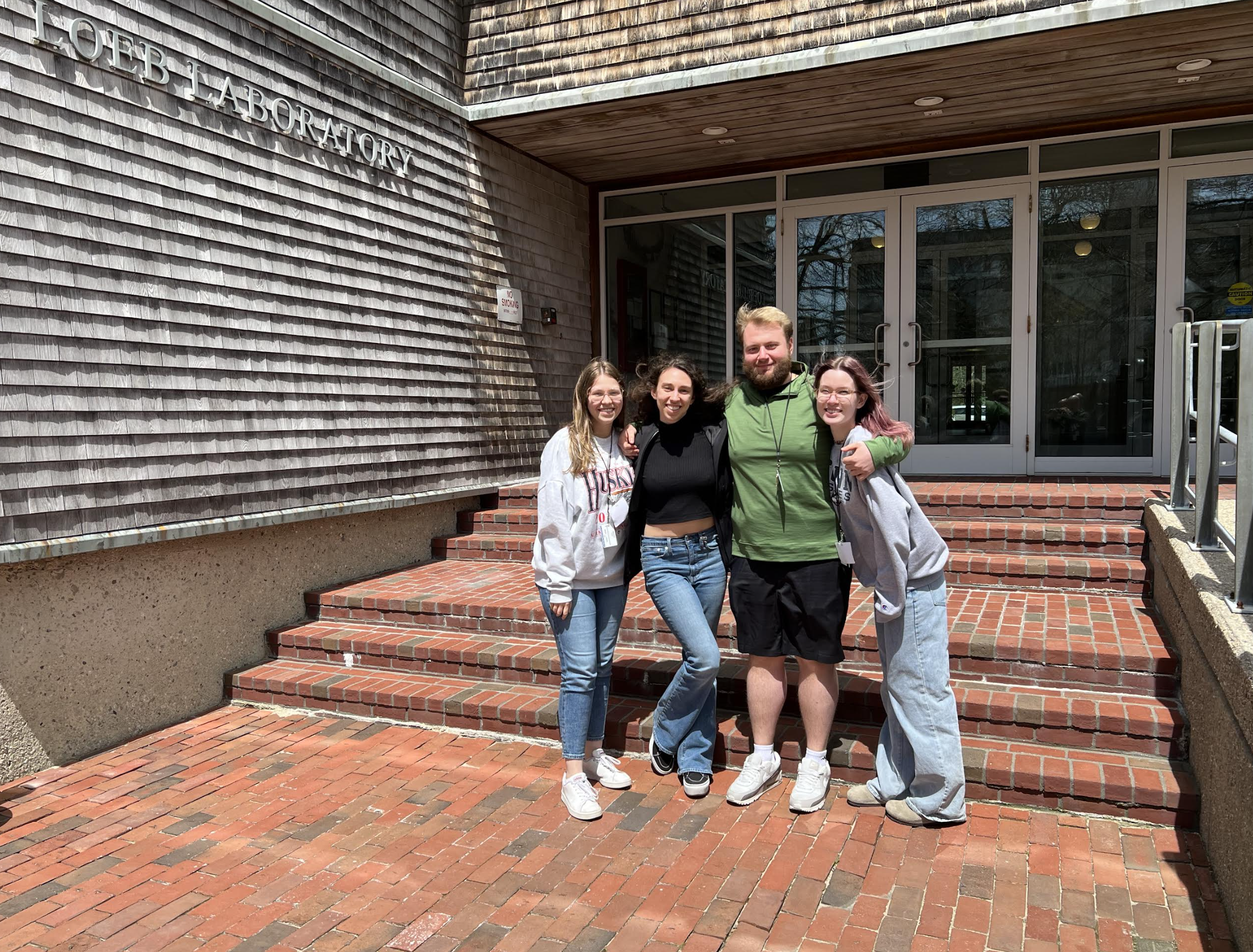 lab posing in front of MBL